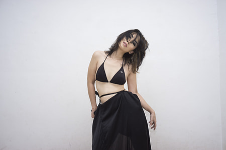 woman wearing black halterneck bikini top thumbnail