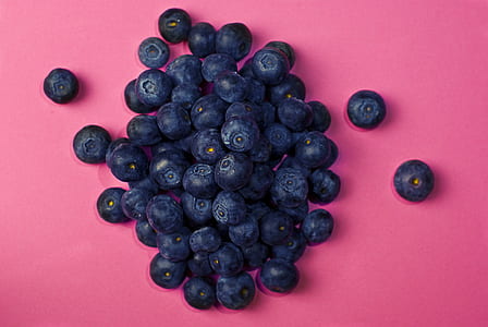 blueberries on pink surface thumbnail