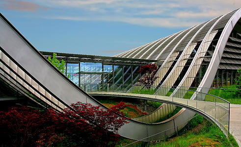 gray architectural building under blue sky at daytime thumbnail