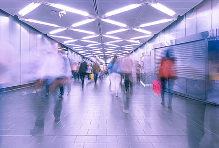 time lapsed photography of peoples passing each other thumbnail