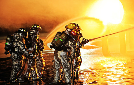 group of firefighter holding water hose thumbnail
