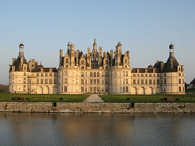 brown castle near body of water thumbnail