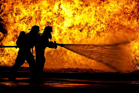 two fireman blowing water using hose on fire thumbnail