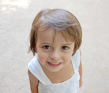 photo of toddler's wearing white floral dress thumbnail