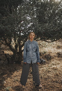 Woman Standing in Front of Tree thumbnail