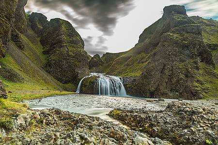 waterfall from mountain at daytime thumbnail