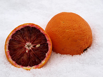 sliced blood orange fruit on snow thumbnail