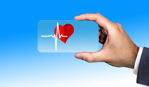 person holding card with heart thumbnail