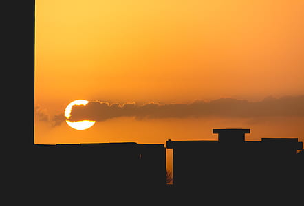 silhouette of building during sunset thumbnail