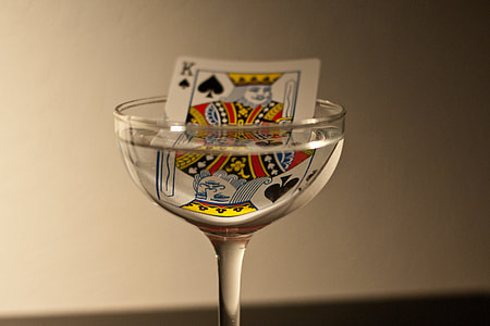 King of Spade playing card on cocktail glass thumbnail