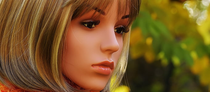 closeup photo of 3D illustration of blonde haired girl thumbnail
