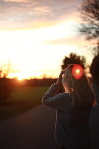 shallow focus photography of woman facing on sunset thumbnail