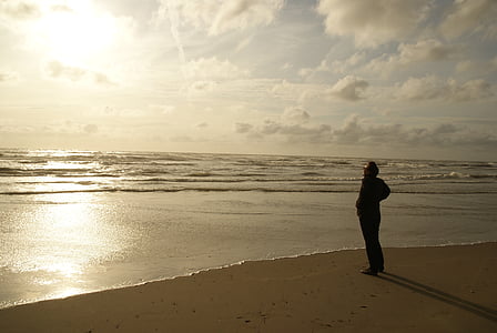 man standing in the shore thumbnail