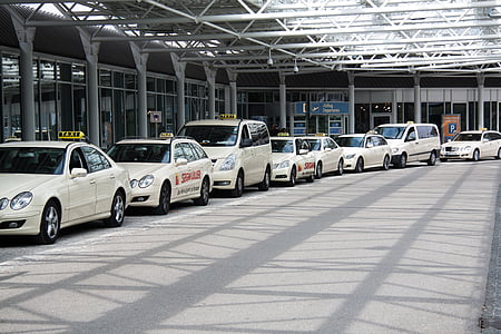 line of white vehicles thumbnail