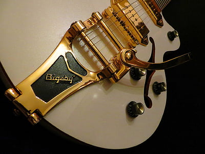 gold and white guitar thumbnail