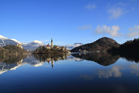 lake near house tower thumbnail