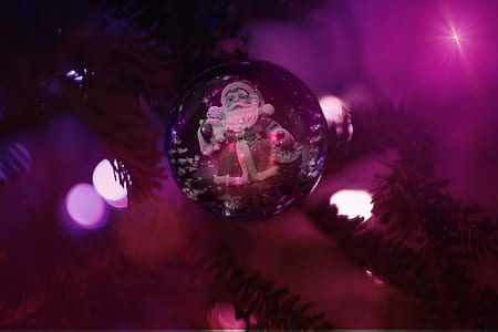 selective focus of Christmas tree with Santa Claus graphic baubles thumbnail