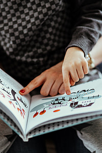 Child reading a book thumbnail