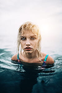 closeup photo of woman in body of water thumbnail