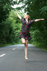 woman in red and black floral short sleeve mini dress thumbnail