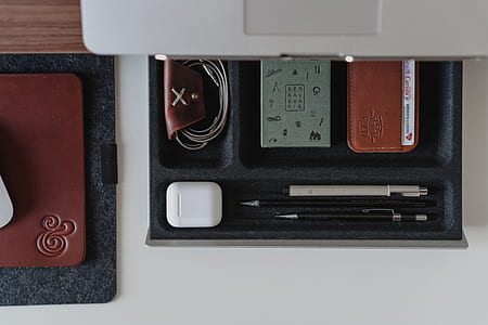 several assorted pens in case thumbnail