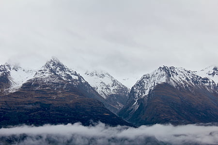 selective focus photography of snow covered mountain thumbnail