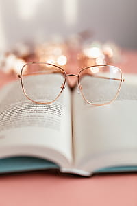 Open book on a pink background thumbnail