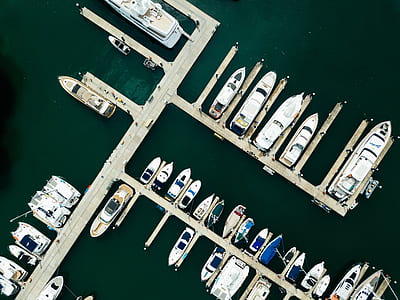 white steel dock near boats thumbnail