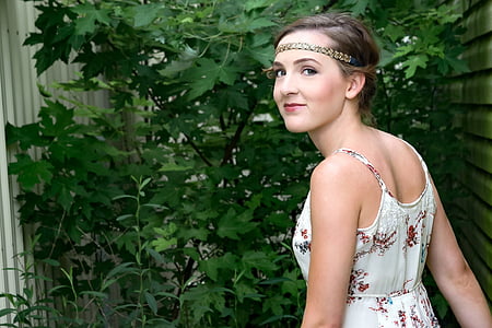 woman wearing white and red floral dress thumbnail