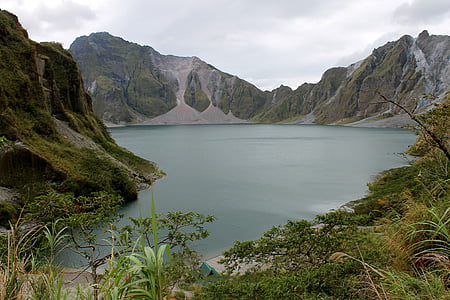 photograph of mountain beside body of water thumbnail