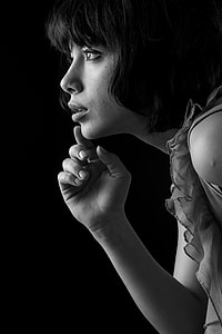 grayscale photo of woman with short black hair thumbnail