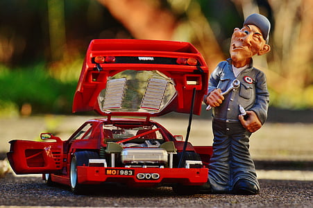 car radio-controlled beside man figurine thumbnail