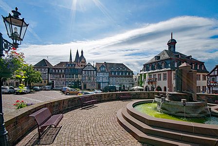cars parked near outdoor fountain thumbnail