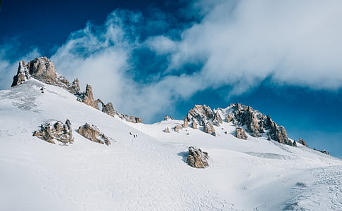 aerial photograph of mountain covered by snow at daytime thumbnail