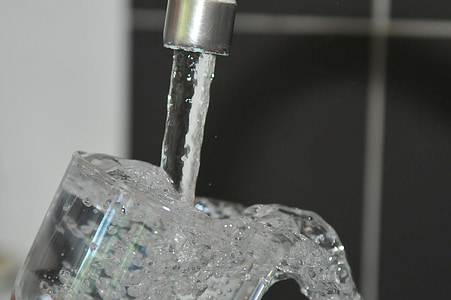 clear drinking glass filled with water thumbnail