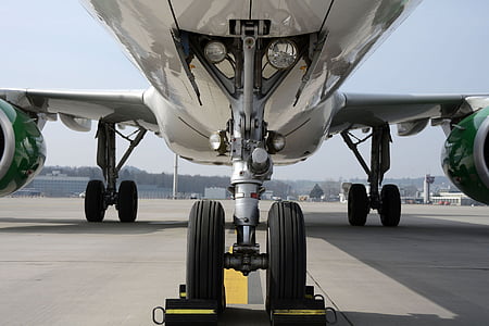 low angle photography of airplane thumbnail