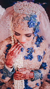 woman wearing pink and blue floral glitter abaya wedding dress with tiara veil thumbnail