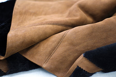 brown and black textile thumbnail