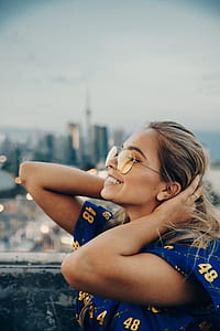 Smiling Woman With Skyline Photo thumbnail