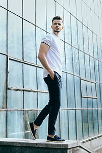 Man Standing on Gray Surface thumbnail