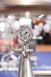 selective focus photography of gray analog gauge thumbnail