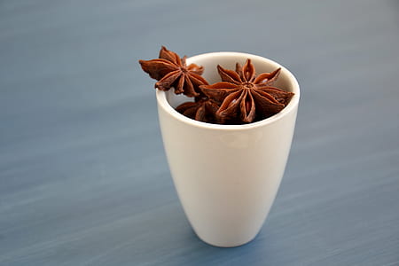 seeds in mug on wooden surface thumbnail