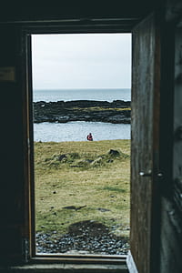 man standing near beach thumbnail