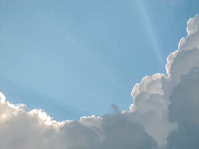 crepuscular rays and white clouds thumbnail