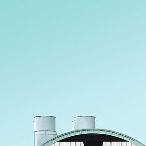 white chimney over roof during daytime thumbnail