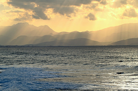 ocean beside mountains thumbnail