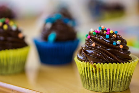 selective focus photography of chocolate cupcake thumbnail