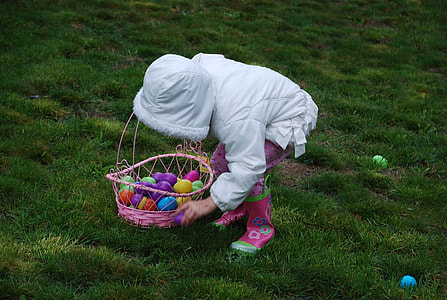 girl collecting Easter eggs thumbnail