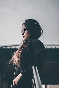 shallow focus photography of woman posing for photo thumbnail