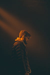 man with brown jacket thumbnail